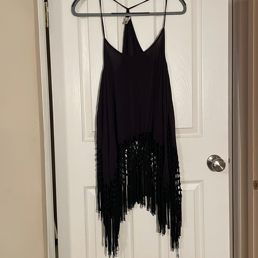 Ladies sleeveless top extra small hangs lower on sides in black crocheted bottom